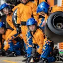 SILVERSTONE, UNITED KINGDOM - JULY 14: Lando Norris, McLaren MCL34, pit stop crew wait for him to enter the pit box during the British GP at Silverstone on July 14, 2019 in Silverstone, United Kingdom. (Photo by Glenn Dunbar / LAT Images)