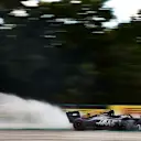 HUNGARORING, HUNGARY - AUGUST 03: Kevin Magnussen, Haas VF-19, kicks up cement dust used to cover oil from a previous on track session during the Hungarian GP at Hungaroring on August 03, 2019 in Hungaroring, Hungary. (Photo by Steve Etherington / LAT Images)