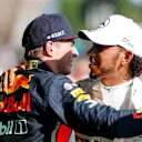 HUNGARORING, HUNGARY - AUGUST 04: Max Verstappen, Red Bull Racing and Race winner Lewis Hamilton, Mercedes AMG F1 celebrate in Parc Ferme during the Hungarian GP at Hungaroring on August 04, 2019 in Hungaroring, Hungary. (Photo by Steven Tee / LAT Images)