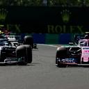 HUNGARORING, HUNGARY - AUGUST 04: Valtteri Bottas, Mercedes AMG W10, battles with Lance Stroll, Racing Point RP19 during the Hungarian GP at Hungaroring on August 04, 2019 in Hungaroring, Hungary. (Photo by Zak Mauger / LAT Images)