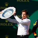 HUNGARORING, HUNGARY - AUGUST 04: Matt Deane, Chief Mechanic, Mercedes AMG, receives the Constructors trophy for Mercedes during the Hungarian GP at Hungaroring on August 04, 2019 in Hungaroring, Hungary. (Photo by Zak Mauger / LAT Images)