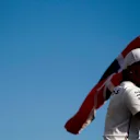 HUNGARORING, HUNGARY - AUGUST 04: Race winner Lewis Hamilton, Mercedes AMG F1 celebrates with a flag during the Hungarian GP at Hungaroring on August 04, 2019 in Hungaroring, Hungary. (Photo by Andy Hone / LAT Images)