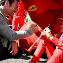 HUNGARORING, HUNGARY - AUGUST 04: Indy 500 winner Simon Pagenaud talks to Charles Leclerc, Ferrari during the Hungarian GP at Hungaroring on August 04, 2019 in Hungaroring, Hungary. (Photo by Mark Sutton / Sutton Images)