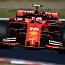 SUZUKA, JAPAN - OCTOBER 13: Charles Leclerc of Monaco driving the (16) Scuderia Ferrari SF90 on the way to the grid before the F1 Grand Prix of Japan at Suzuka Circuit on October 13, 2019 in Suzuka, Japan. (Photo by Clive Mason/Getty Images)