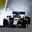 SUZUKA, JAPAN - OCTOBER 13: Antonio Giovinazzi of Italy driving the (99) Alfa Romeo Racing C38 Ferrari locks a wheel under braking during the F1 Grand Prix of Japan at Suzuka Circuit on October 13, 2019 in Suzuka, Japan. (Photo by Clive Mason/Getty Images)