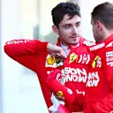 SUZUKA, JAPAN - OCTOBER 13: Charles Leclerc of Monaco and Ferrari talks with second placed Sebastian Vettel of Germany and Ferrari in parc ferme during the F1 Grand Prix of Japan at Suzuka Circuit on October 13, 2019 in Suzuka, Japan. (Photo by Dan Istitene/Getty Images)