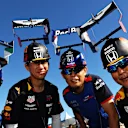 SUZUKA, JAPAN - OCTOBER 13: Red Bull Racing and Scuderia Toro Rosso fans show their support before