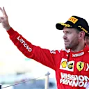 SUZUKA, JAPAN - OCTOBER 13: Second placed Sebastian Vettel of Germany and Ferrari celebrates on the podium during the F1 Grand Prix of Japan at Suzuka Circuit on October 13, 2019 in Suzuka, Japan. (Photo by Mark Thompson/Getty Images)