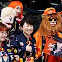 SUZUKA, JAPAN - OCTOBER 10: Red Bull Racing fans show their support during previews ahead of the F1