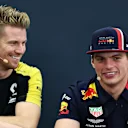 SUZUKA, JAPAN - OCTOBER 10: Nico Hulkenberg of Germany and Renault Sport F1 and Max Verstappen of Netherlands and Red Bull Racing talk in the Drivers Press Conference during previews ahead of the F1 Grand Prix of Japan at Suzuka Circuit on October 10, 2019 in Suzuka, Japan. (Photo by Dan Istitene/Getty Images)