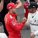 MEXICO CITY, MEXICO - OCTOBER 27: Race winner Lewis Hamilton of Great Britain and Mercedes GP and second placed Sebastian Vettel of Germany and Ferrari celebrate in parc ferme during the F1 Grand Prix of Mexico at Autodromo Hermanos Rodriguez on October 27, 2019 in Mexico City, Mexico. (Photo by Charles Coates/Getty Images)
