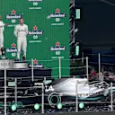 MEXICO CITY, MEXICO - OCTOBER 27: A general view as race winner Lewis Hamilton of Great Britain and Mercedes GP, second placed Sebastian Vettel of Germany and Ferrari and third placed Valtteri Bottas of Finland and Mercedes GP celebrate on the podium during the F1 Grand Prix of Mexico at Autodromo Hermanos Rodriguez on October 27, 2019 in Mexico City, Mexico. (Photo by Charles Coates/Getty Images)