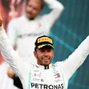 MEXICO CITY, MEXICO - OCTOBER 27: Race winner Lewis Hamilton of Great Britain and Mercedes GP celebrates on the podium during the F1 Grand Prix of Mexico at Autodromo Hermanos Rodriguez on October 27, 2019 in Mexico City, Mexico. (Photo by Clive Mason/Getty Images)