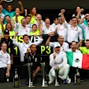 MEXICO CITY, MEXICO - OCTOBER 27: Race winner Lewis Hamilton of Great Britain and Mercedes GP and third placed Valtteri Bottas of Finland and Mercedes GP celebrate with their team after the F1 Grand Prix of Mexico at Autodromo Hermanos Rodriguez on October 27, 2019 in Mexico City, Mexico. (Photo by Dan Istitene/Getty Images)