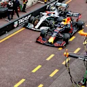 MONTE CARLO, MONACO - MAY 26: Max Verstappen, Red Bull Racing RB15, and Valtteri Bottas, Mercedes AMG W10, battle in the pit lane during the Monaco GP at Monte Carlo on May 26, 2019 in Monte Carlo, Monaco. (Photo by Glenn Dunbar / LAT Images)