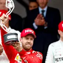 MONTE CARLO, MONACO - MAY 26: Sebastian Vettel, Ferrari celebrates on the podium with the trophy during the Monaco GP at Monte Carlo on May 26, 2019 in Monte Carlo, Monaco. (Photo by Glenn Dunbar / LAT Images)