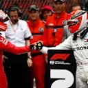 MONTE CARLO, MONACO - MAY 26: Sebastian Vettel, Ferrari, 2nd position, congratulates Lewis Hamilton, Mercedes AMG F1, 1st position, in Parc Ferme during the Monaco GP at Monte Carlo on May 26, 2019 in Monte Carlo, Monaco. (Photo by Andy Hone / LAT Images)