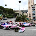 MONTE CARLO, MONACO - MAY 26: Lance Stroll, Racing Point RP19, leads Kimi Raikkonen, Alfa Romeo Racing C38, and Sergio Perez, Racing Point RP19 during the Monaco GP at Monte Carlo on May 26, 2019 in Monte Carlo, Monaco. (Photo by Gareth Harford / Sutton Images)