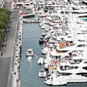 MONTE CARLO, MONACO - MAY 26: Lewis Hamilton, Mercedes AMG F1 W10, leads Max Verstappen, Red Bull Racing RB15, Sebastian Vettel, Ferrari SF90, Valtteri Bottas, Mercedes AMG W10, Pierre Gasly, Red Bull Racing RB15, and the rest of the field during the Monaco GP at Monte Carlo on May 26, 2019 in Monte Carlo, Monaco. (Photo by Joe Portlock / LAT Images)