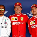 SOCHI, RUSSIA - SEPTEMBER 28: Top three qualifiers Charles Leclerc of Monaco and Ferrari,Lewis Hamilton of Great Britain and Mercedes GP and Sebastian Vettel of Germany and Ferrari celebrate in parc ferme during qualifying for the F1 Grand Prix of Russia at Sochi Autodrom on September 28, 2019 in Sochi, Russia. (Photo by Will Taylor-Medhurst/Getty Images)