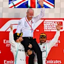 CIRCUIT DE BARCELONA-CATALUNYA, SPAIN - MAY 12: Valtteri Bottas, Mercedes AMG F1, 2nd position, and Lewis Hamilton, Mercedes AMG F1, 1st position, lift Dr Dieter Zetsche, CEO, Mercedes Benz, on their shoulders on the podium during the Spanish GP at Circuit de Barcelona-Catalunya on May 12, 2019 in Circuit de Barcelona-Catalunya, Spain. (Photo by Mark Sutton / Sutton Images)