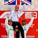 CIRCUIT DE BARCELONA-CATALUNYA, SPAIN - MAY 12: Valtteri Bottas, Mercedes AMG F1, 2nd position, and Lewis Hamilton, Mercedes AMG F1, 1st position, lift Dr Dieter Zetsche, CEO, Mercedes Benz, on their shoulders on the podium during the Spanish GP at Circuit de Barcelona-Catalunya on May 12, 2019 in Circuit de Barcelona-Catalunya, Spain. (Photo by Mark Sutton / Sutton Images)