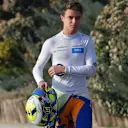 CIRCUIT DE BARCELONA-CATALUNYA, SPAIN - FEBRUARY 21: Lando Norris, McLaren walks in after a trip into the gravel during the Barcelona February testing at Circuit de Barcelona-Catalunya on February 21, 2019 in Circuit de Barcelona-Catalunya, Spain. (Photo by Jerry Andre / Sutton Images)