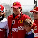 CIRCUIT DE BARCELONA-CATALUNYA, SPAIN - MARCH 01: (L to R): Antonio Giovinazzi, Alfa Romeo Racing, John Elkann, FIAT Chairman with his son and Charles Leclerc, Ferrari during the Barcelona February testing II at Circuit de Barcelona-Catalunya on March 01, 2019 in Circuit de Barcelona-Catalunya, Spain. (Photo by Zak Mauger / LAT Images)