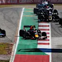 AUSTIN, TEXAS - NOVEMBER 03: Alexander Albon of Thailand driving the (23) Aston Martin Red Bull Racing RB15 and Carlos Sainz of Spain driving the (55) McLaren F1 Team MCL34 Renault battle for position at thestart during the F1 Grand Prix of USA at Circuit of The Americas on November 03, 2019 in Austin, Texas. (Photo by Dan Istitene/Getty Images)