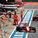 NORTHAMPTON, ENGLAND - AUGUST 07: Charles Leclerc of Monaco driving the (16) Scuderia Ferrari SF1000 and Sebastian Vettel of Germany driving the (5) Scuderia Ferrari SF1000 in the Pitlane  during practice for the F1 70th Anniversary Grand Prix at Silverstone on August 07, 2020 in Northampton, England. (Photo by Clive Mason - Formula 1/Formula 1 via Getty Images)