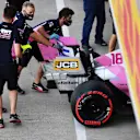 NORTHAMPTON, ENGLAND - AUGUST 08: Racing Point team members push the car of Lance Stroll of Canada driving the (18) Racing Point RP20 Mercedes in the Pitlane during final practice for the F1 70th Anniversary Grand Prix at Silverstone on August 08, 2020 in Northampton, England. (Photo by Ben Stansall/Pool via Getty Images)