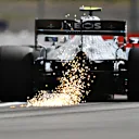 NORTHAMPTON, ENGLAND - AUGUST 08: Sparks fly behind Valtteri Bottas of Finland driving the (77) Mercedes AMG Petronas F1 Team Mercedes W11 during qualifying for the F1 70th Anniversary Grand Prix at Silverstone on August 08, 2020 in Northampton, England. (Photo by Clive Mason - Formula 1/Formula 1 via Getty Images)