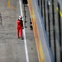 NORTHAMPTON, ENGLAND - AUGUST 08: Sebastian Vettel of Germany and Ferrari walks into the garage during qualifying for the F1 70th Anniversary Grand Prix at Silverstone on August 08, 2020 in Northampton, England. (Photo by Rudy Carezzevoli/Getty Images)