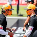 NORTHAMPTON, ENGLAND - AUGUST 09: Carlos Sainz of Scuderia Renault and Spain with Lando Norris of McLaren and Great Britain during the F1 70th Anniversary Grand Prix at Silverstone on August 09, 2020 in Northampton, England. (Photo by Peter Fox/Getty Images)