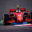 ABU DHABI, UNITED ARAB EMIRATES - DECEMBER 11: Charles Leclerc of Monaco driving the (16) Scuderia Ferrari SF1000 on track during practice ahead of the F1 Grand Prix of Abu Dhabi at Yas Marina Circuit on December 11, 2020 in Abu Dhabi, United Arab Emirates. (Photo by Giuseppe Cacace - Pool/Getty Images)