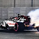 ABU DHABI, UNITED ARAB EMIRATES - DECEMBER 11: Fire emerges from the car of Kimi Raikkonen of Finland driving the (7) Alfa Romeo Racing C39 Ferrari during practice ahead of the F1 Grand Prix of Abu Dhabi at Yas Marina Circuit on December 11, 2020 in Abu Dhabi, United Arab Emirates. (Photo by Getty Images/Getty Images)