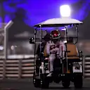 ABU DHABI, UNITED ARAB EMIRATES - DECEMBER 11: Kimi Raikkonen of Finland and Alfa Romeo Racing is given a lift back to the pits after stopping on track during practice ahead of the F1 Grand Prix of Abu Dhabi at Yas Marina Circuit on December 11, 2020 in Abu Dhabi, United Arab Emirates. (Photo by Rudy Carezzevoli/Getty Images)