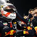 ABU DHABI, UNITED ARAB EMIRATES - DECEMBER 13: Race winner Max Verstappen of Netherlands and Red Bull Racing celebrates with his team in parc ferme during the F1 Grand Prix of Abu Dhabi at Yas Marina Circuit on December 13, 2020 in Abu Dhabi, United Arab Emirates. (Photo by Mark Thompson/Getty Images)