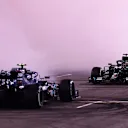 ABU DHABI, UNITED ARAB EMIRATES - DECEMBER 13: Second placed Valtteri Bottas of Finland and Mercedes GP and third placed Lewis Hamilton of Great Britain and Mercedes GP perform donuts following the F1 Grand Prix of Abu Dhabi at Yas Marina Circuit on December 13, 2020 in Abu Dhabi, United Arab Emirates. (Photo by Mario Renzi - Formula 1/Formula 1 via Getty Images)