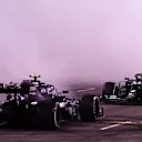 ABU DHABI, UNITED ARAB EMIRATES - DECEMBER 13: Second placed Valtteri Bottas of Finland and Mercedes GP and third placed Lewis Hamilton of Great Britain and Mercedes GP perform donuts following the F1 Grand Prix of Abu Dhabi at Yas Marina Circuit on December 13, 2020 in Abu Dhabi, United Arab Emirates. (Photo by Mario Renzi - Formula 1/Formula 1 via Getty Images)