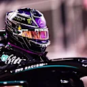 BAHRAIN, BAHRAIN - NOVEMBER 28: Pole position qualifier Lewis Hamilton of Great Britain and Mercedes GP climbs out of his car in parc ferme during qualifying ahead of the F1 Grand Prix of Bahrain at Bahrain International Circuit on November 28, 2020 in Bahrain, Bahrain. (Photo by Mario Renzi - Formula 1/Formula 1 via Getty Images)