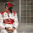 BAHRAIN, BAHRAIN - NOVEMBER 29: Kimi Raikkonen of Finland and Alfa Romeo Racing looks on from the pitwall during the F1 Grand Prix of Bahrain at Bahrain International Circuit on November 29, 2020 in Bahrain, Bahrain. (Photo by Mark Thompson/Getty Images)