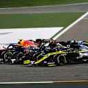 BAHRAIN, BAHRAIN - NOVEMBER 29: Alexander Albon of Thailand driving the (23) Aston Martin Red Bull Racing RB16, Valtteri Bottas of Finland driving the (77) Mercedes AMG Petronas F1 Team Mercedes W11 and Daniel Ricciardo of Australia driving the (3) Renault Sport Formula One Team RS20 battle for position at the start during the F1 Grand Prix of Bahrain at Bahrain International Circuit on November 29, 2020 in Bahrain, Bahrain. (Photo by Dan Istitene - Formula 1/Formula 1 via Getty Images)