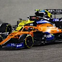 BAHRAIN, BAHRAIN - NOVEMBER 29: Carlos Sainz of Spain driving the (55) McLaren F1 Team MCL35 Renault leads Esteban Ocon of France driving the (31) Renault Sport Formula One Team RS20 during the F1 Grand Prix of Bahrain at Bahrain International Circuit on November 29, 2020 in Bahrain, Bahrain. (Photo by Dan Istitene - Formula 1/Formula 1 via Getty Images)
