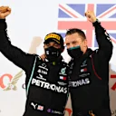 BAHRAIN, BAHRAIN - NOVEMBER 29: Race winner Lewis Hamilton of Great Britain and Mercedes GP celebrates on the podium during the F1 Grand Prix of Bahrain at Bahrain International Circuit on November 29, 2020 in Bahrain, Bahrain. (Photo by Clive Mason - Formula 1/Formula 1 via Getty Images)