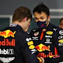 BAHRAIN, BAHRAIN - NOVEMBER 29: Second placed Max Verstappen of Netherlands and Red Bull Racing and third placed Alexander Albon of Thailand and Red Bull Racing celebrate in parc ferme during the F1 Grand Prix of Bahrain at Bahrain International Circuit on November 29, 2020 in Bahrain, Bahrain. (Photo by Mark Thompson/Getty Images)
