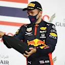 BAHRAIN, BAHRAIN - NOVEMBER 29: Third placed Alexander Albon of Thailand and Red Bull Racing celebrates on the podium during the F1 Grand Prix of Bahrain at Bahrain International Circuit on November 29, 2020 in Bahrain, Bahrain. (Photo by Bryn Lennon/Getty Images)