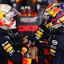 BAHRAIN, BAHRAIN - NOVEMBER 29: Second placed Max Verstappen of Netherlands and Red Bull Racing and third placed Alexander Albon of Thailand and Red Bull Racing celebrate in parc ferme during the F1 Grand Prix of Bahrain at Bahrain International Circuit on November 29, 2020 in Bahrain, Bahrain. (Photo by Dan Istitene - Formula 1/Formula 1 via Getty Images)