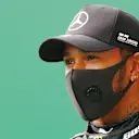 SPA, BELGIUM - AUGUST 29: Pole position qualifier Lewis Hamilton of Great Britain and Mercedes GP looks on in parc ferme during qualifying for the F1 Grand Prix of Belgium at Circuit de Spa-Francorchamps on August 29, 2020 in Spa, Belgium. (Photo by Francois Lenoir/Pool via Getty Images)