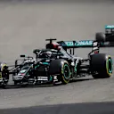 SPA, BELGIUM - AUGUST 30: Lewis Hamilton of Great Britain driving the (44) Mercedes AMG Petronas F1 Team Mercedes W11 leads Valtteri Bottas of Finland driving the (77) Mercedes AMG Petronas F1 Team Mercedes W11 during the F1 Grand Prix of Belgium at Circuit de Spa-Francorchamps on August 30, 2020 in Spa, Belgium. (Photo by Stephanie Lecocq/Pool via Getty Images)